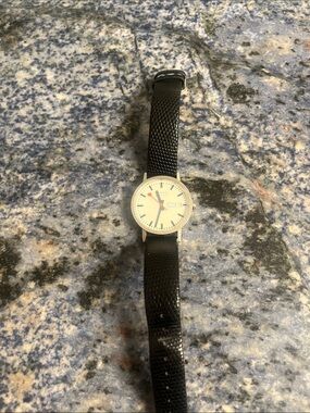 Mondaine White Dial Watch with Black Strap and Red Second Hand